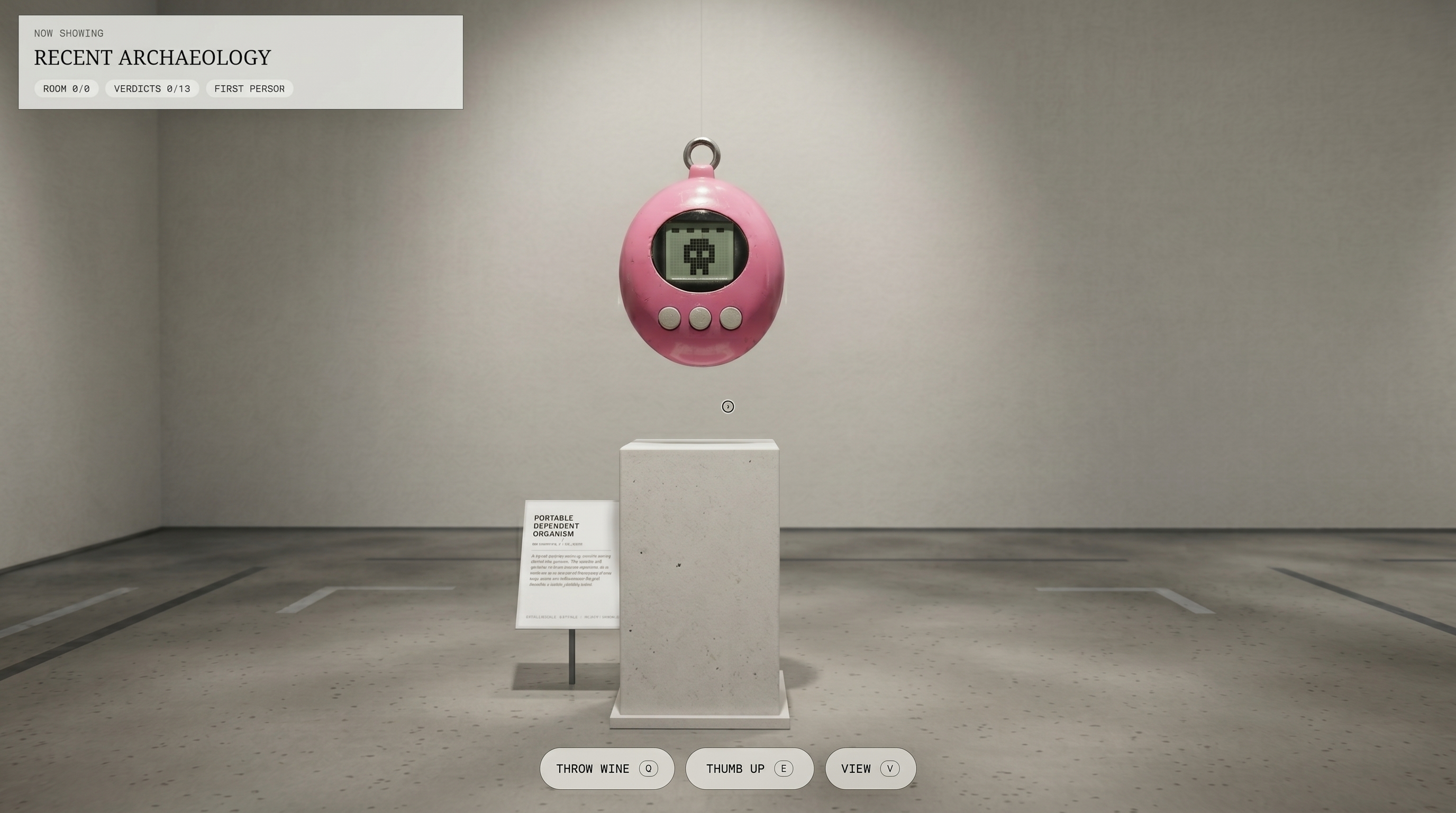 Recent Archaeology — a Tamagotchi on a chalk-white pedestal under its accession tag